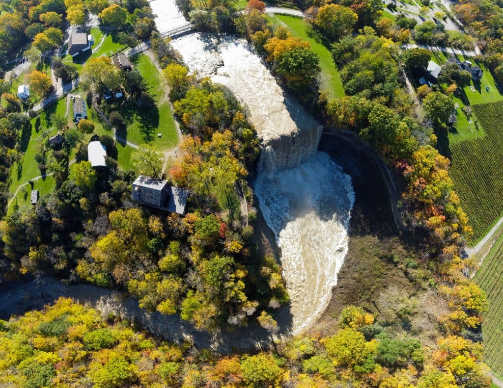 Ball's Falls from the air, the creek dropping through a bowl of autumn trees