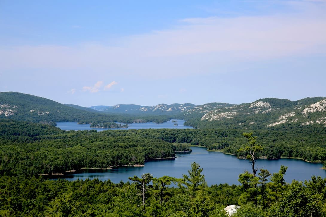 The view over the lakes and white La Cloche ridges from a clifftop in Killarney Provincial Park