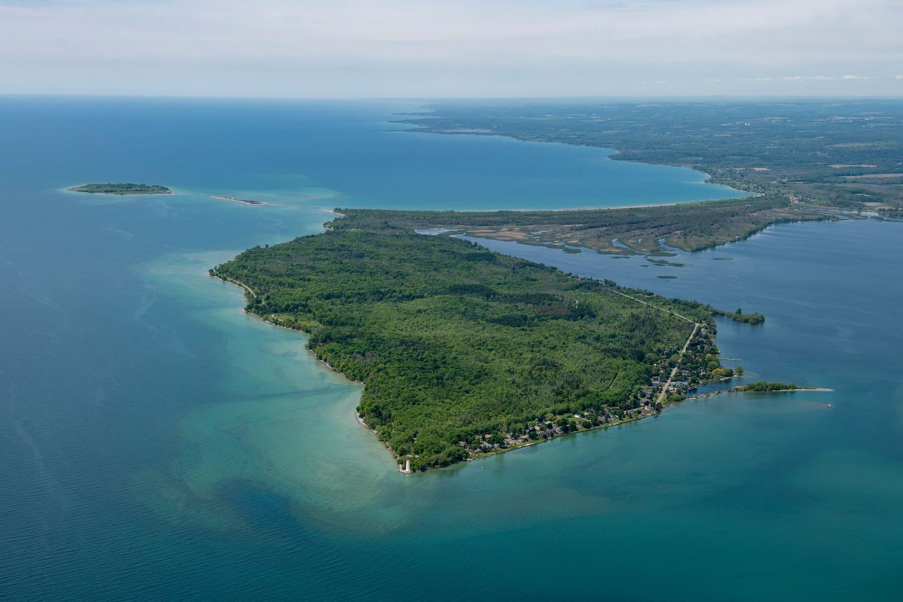 Presqu'ile from the air, a wooded peninsula hooking out into Lake Ontario
